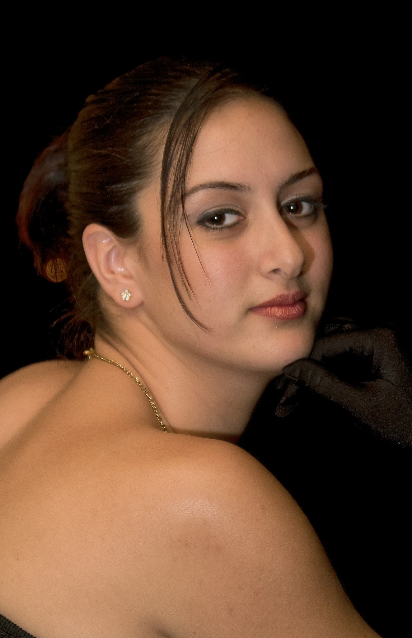 Young Woman against black background