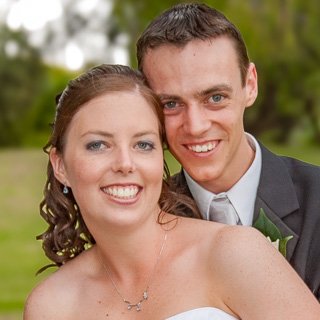 Wedding Couple embracing in Garden