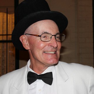 Man in White Suit and Top Hat
