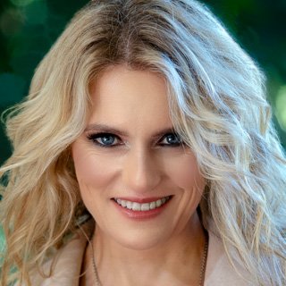 Young Blonde Woman Close up of Face Portrait in Garden