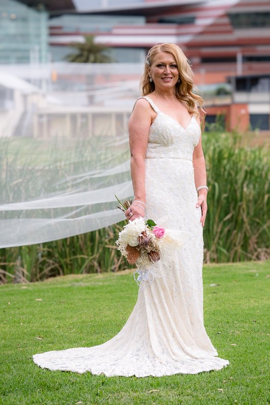 Bride with Flowing Veil next to River Torrens